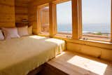#OffGrid #modern #structure #form #interior #inside #indoors #windows #naturallight #bedroom #bed #shelves #storage #ChristopherCampbellArchitecture