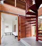 #modern #architecture #modernarchitecture #interior #glass #wood #bedroom #stairs #spiralstaircase #minimal #BigIsland #Hawaii #lavaflow #kipuka #CraigSteely #CraigSteelyArchitecture