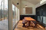 #modern #architecture #modernarchitecture #OzarkMountains #Ozarks #remote #retreat #offthegrid #minimal #LEED #interior #kitchen #diningtable #DENArchitecture 