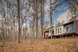 #modern #architecture #modernarchitecture #OzarkMountains #Ozarks #remote #retreat #offthegrid #minimal #LEED #wood #exterior #deck #DENArchitecture 