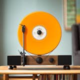 How about this upright record player to start a conversation‚ or to brighten a living room with sound, color, and style?