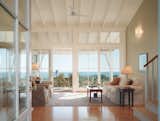 The Block Island House

Sliding glass doors part to invite the sun-drenched ocean breeze inside. Resting below awning windows, the doors open flawlessly and never interrupt the view.  Photo 12 of 15 in view by Michelle Bâby from Indoor/Outdoor Transitions