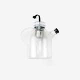 Menu's Glass Kettle Teapot by Norm Architects uniquely embraces the meeting of two traditions - Asian zen philosophy and modern Scandinavian design. A special feature is the teapot’s transparency that grants a visual experience of the tea, and stimulates the senses of sight, touch, and smell alike. As a fine design detail, the tea egg is placed in the center of the pot and is easily raised by pulling the attached silicon string when the tea is ready for serving.
