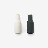The unique, inverted design ensures that salt, pepper, pumpkin seeds, dried blueberries, walnuts – or whatever you fill them with - only sprinkle out when you grind, leaving no trace on the table or in the kitchen. The Grinders have a bottle like shape, which is also important to the whole experience. Comes in a set of two.