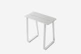 I-O Stool is a minimal stool created by Auckland-based designers Pausma. I-O Stool is designed as an indoor-outdoor stool that suits many occasions, and can be flat packed for ease of shipping locally and internationally. The stool’s seating pan inclines for comfort, and a channel in the middle allows a leather pad to be added. I-O Stool is available in a matte silver finish, with an optional black leather seat pad.