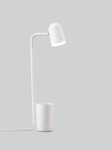 Buddy is a minimal lamp created by Copenhagen-based designer Mads Sætter-Lassen. This unassuming desk lamp is just that, a multi-functional design that gives busy individuals a base to come back to. Equipped with a holder to contain pens, pencils, keys or loose change, Buddy lends a hand when you need help keeping track of essentials. As Buddy organizes small items, it helps surfaces remain uncluttered and keeps important objects within reach. The multi-directional shade enables the beam to be directed towards the area where light is needed. Available in matt finishes of dark grey, off-white, green and Marsala, Buddy suits a variety of interiors and applications. Wherever you place it, Buddy promises to be a fun and quirky companion you’ll enjoy getting acquainted with.