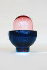 Una is a minimal modular light, by the Oslo-based design duo Domaas/Høgh. Inspired by the beauty of hot air balloons, Kathrine Høgh and Ane Domaas effortlessly play with different color combinations. The layers of colored glass compliment each other to create a unique hue. Una is an intentionally fun object that works as a mood light, allowing the user to effortlessly customize the design.