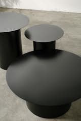 Chiodo is a minimal table and stool created by Italy-based designer Marco Ripa. Ripa is a craftsman and designer, working specifically with iron and steel as his materials of choice. His most recent design was inspired by a simple nail; the table features a surface resembling that of a flathead screw without the drive. The table is accompanied with a matching set of stools, both of which are finished with powder coating. In addition, the base features storage that can be accessible by lifting up the surface.
