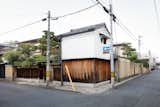 House with a Kura is a minimal home located inGosho-Higashi, Japan, designed by CASE-REAL. The clients are a creative director involved in many food related projects, and the other a gallerist who has been introducing traditional craftsmanship of Japan. The architects aimed to create a new space where the clients could face their profession of “food” and “lifestyle”.  A place where multi-functions (a gallery, tearoom, office and guest room) influence each other. For the overall design plan, the office was placed on the second floor, and a tearoom with a counter to sit six guests on the ground floor, a gallery space to exhibit pottery and everyday tools, and a guest room was created.