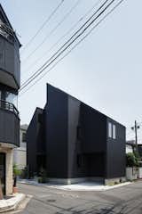 The Shift House is a minimal residence located in Tokyo, Japan, designed by Kino Architects. The mostly black exterior has  segregated angular roofs creating a striking overall appearance from the street, which is starkly contrasted by its bright and airy interior.&nbsp;