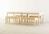 Wakufuru is a minimal family of tables and benches created by Sweden-based designer Johan Kauppi. The collection is a system of tables and benches which bring together sound absorption and solid wood in an innovative way. The unique corner construction of the furniture creates a consistent system where all table and bench units are produced in exactly the same way, regardless of size or height. Hidden under each furniture is an effective sound absorption pad, structured in several layers. The rounded tables and benches are produced in ash with the frame recessed into round wooden legs. The top is veneered in MDF. Underneath, a hidden acoustic filling consists of felt, perforated board, foam, and an air gap for the best possible sound absorption.