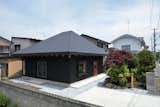 MU is a minimalist architecture project located in Aomori, Japan, designed by Ikeda Yukie Architects. The house serves as both a residence and photo studio for the clients. In order to create an openness that would also protect against the harsh climate, the architects created a deformed quadrangular pyramid that faces the street. Transitioning from a private to public space is as simples as opening the sliding partitions within the space.
