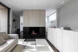 Living Room, Wood Burning Fireplace, Dark Hardwood Floor, Recessed Lighting, and Sofa  Photos from Penthouse O