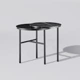 Closer is a minimalist side table created by Sweden and Spain-based designer Sanna Völker for Bolia. An airy and elegant side table available in two variants; the smart-looking fully black version or the option of intriguing red marble. As if caught in a movement the two table tops interact to create an alliance of marble and wood. The intersection of the legs create a playful and lightweight contrast to the sturdy top. The table was named after the album Closer by Joy Division after reading a comment by Peter Saville, the designer behind the album artwork: “This cover for the band’s second album was like a work of antiquity, but inside is a vinyl album, so it’s a postmodern juxtaposition of a contemporary work housed in the antique.”