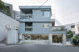 Kamiyami Residence is a minimal architecture project located in Tokyo, Japan, designed by PUDDLE. Kamiyami Residence is a double-story house on top of a design office renovated from a forty year old steel frame structure which had been left untouched for several years. The property is built on a-sloping side street of a commercial area- with unique shops, offices, restaurants and cafés called “Okushibu” connecting Shibuya Station and Yoyogi Park. The street leads to a quiet residential area adjacent to Okushibu, with a number of embassies. The designers started planning this building with the idea it will be a case study for a nodal point connecting the two areas -even though it’s only a small project.