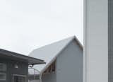 House in Bungotakada is a minimal architecture project located in Oita, Japan, designed by Yabashi Architect & Associates. The owner wanted a spacious and bright space that would also accommodate guests. In order to lower costs, the architects chose to create split-level segmented programs. The split levels would divide the space without the use of partitions or walls. In doing so, each space is opened up to another, allowing light and wind to flow throughout the entire home.