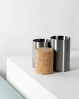 NESU is a minimal container created by Taipei-based designer Kenyon Yeh. Nesu is a series of simple nesting containers. It is easy to arrange or stack for a working desktop. A hidden magnet inside the cork use to hold clips and two cylinder tubes can be easily joined together because of the magnetic cork. Keeping Nesu all together in one place. Nesu deliver a new way to arrange your desktop things, whether it be pencils, pens, scissors, rulers, etc.