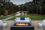 Firepit and view to poolhouse