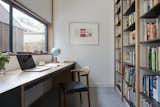 One homeowner is studying part-time and requested a quiet workspace in the home. Her desk is made out of plywood and licorice linea from Laminex.