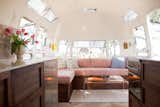 Art teacher Ellen Prasse and her partner, artist and writer Kate Oliver, transformed their lives in 2014 when they renovated their own 1977 Airstream. The personal project led them to launch their own business, The Modern Caravan, where they renovate Airstreams on a client-by-client basis. The owners of the vintage Airstream pictured above wanted the small space to function as their full-time residence with enough space for their two dogs—and to host guests, on occasion.
