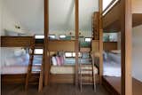 "The two queen bedrooms can handle two couples, while the bunk-bed room can handle all the kids," Thompson says. She also made sure every bunk had a window, to act as a "mini room."

