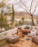 Finding a balance between texture and color is key to this desert look, which can even mean bringing indoor blankets and pillows outdoors for an occasion.&nbsp;