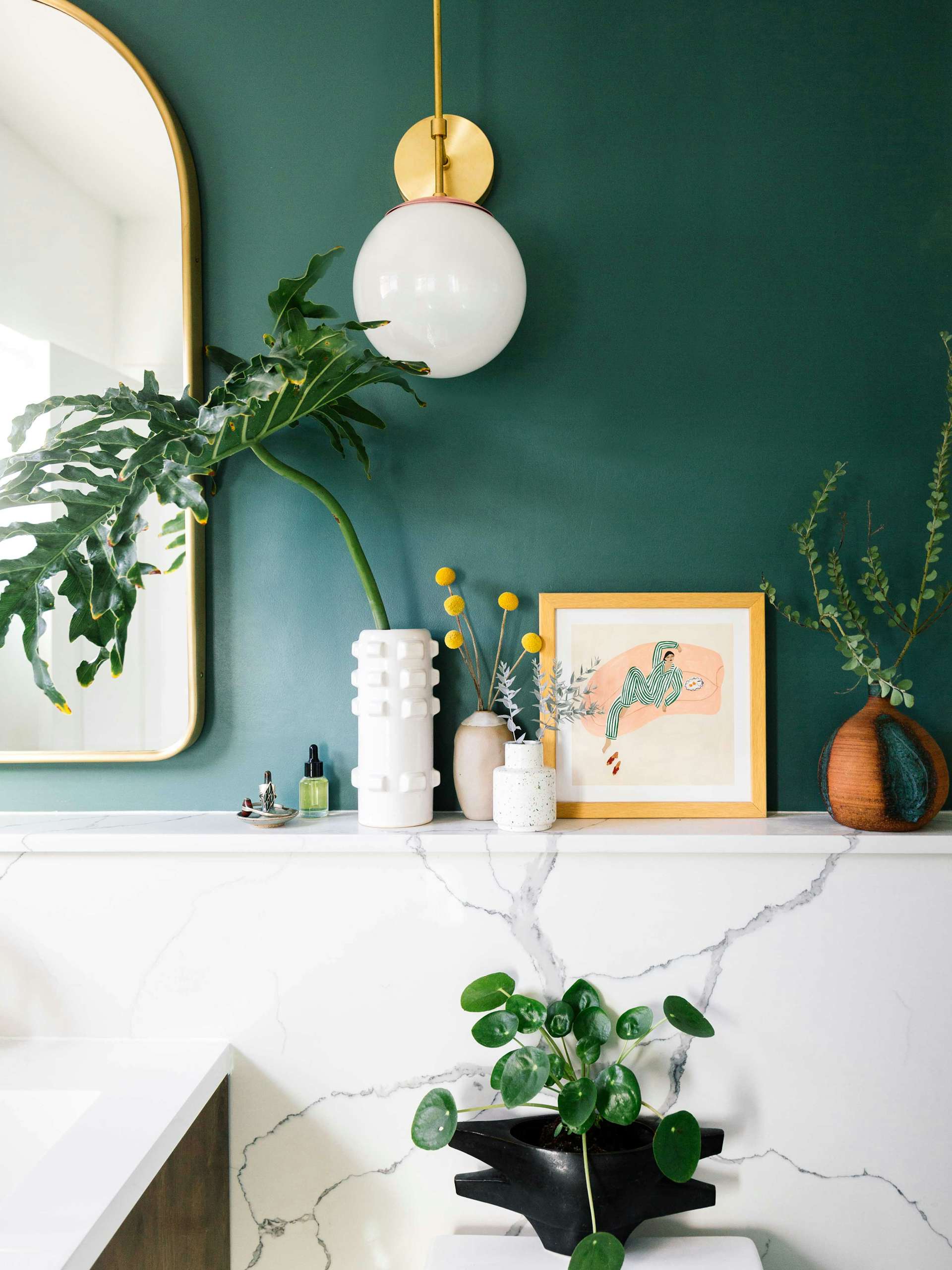 When space is tight, Dabito says that you should also consider designing niches for storage. In this case, a shelf was added for plants and cosmetics. 