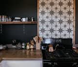 If you find a particular tile with black accents, do like Tim and Merrill Melideo and work with the shade throughout your kitchen. 