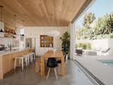 Courtyard House by Ras-a Studio dining room and kitchen