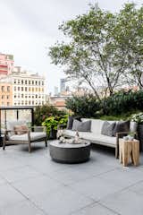 The 400-square-foot outdoor space, a rarity in New York City, was designed to feel like a California oasis. "It's the perfect spot to kick back and entertain," Becky says. 