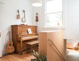 Carriage House by Medium Plenty music area at the top of a staircase