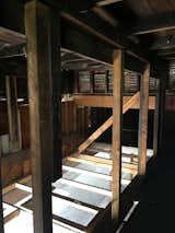 Before: The original hayloft was more than a century old, and the team rebuilt it for the addition. 