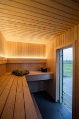 The smallest offering, My Galia, is a sauna enveloped in spruce.  Photo 4 of 5 in A New Prefab Company Is Offering a Cluster of Scandinavian-Inspired Cabins Starting at $70K