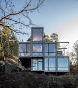 A Shipping Container Home Rises on a Rocky Site Outside Stockholm