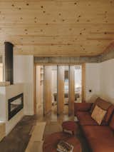 Living room in Passive House in Cerros de Madrid by Slow Studio