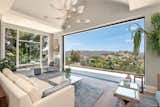 Kolbe multi-slide doors cleanly pocket into the walls, fully opening the home to outdoor vistas and canyon breezes.