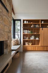 The couple chose polished concrete throughout the home to contrast alongside more textural timber. The concrete has thermal heating below it to stay warm in the winter.