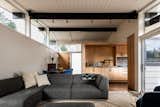 Living area of Meadowbrook Midcentury by Cast Architecture
