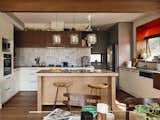 Mixing and matching woods is a simple way to liven up a space. 
