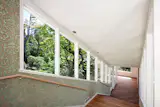 Before: Staircase in Tranquil Terraced Piedmont Home by Regan Baker Design
