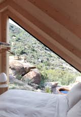 This cabin was just completed in the mountains of California, and it overlooks a plunge pool.  Photo 3 of 10 in These $31K Micro Cabins Are Light Enough to Be Dropped Into Place by a Helicopter