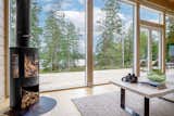 Floor-to-ceiling windows bring the views inside. Currently, Pluspuu is available in the U.S., Canada, and Europe.  Photo 5 of 8 in Prefab Builder Pluspuu Makes New and Improved Log Cabins Starting at $175K