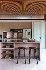 This example features a full kitchen with an island in stainless steel.