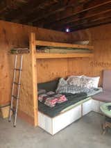 The original bedroom had two very basic bunks.  Photo 4 of 15 in Budget Breakdown: She Turned a Joshua Tree Shack Into a Homestead for the Long Haul With $456K