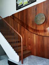 "The wall paneling and railing at the entry required very close collaboration with metal and wood fabricators,