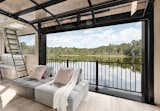All of the cabins feature a garage door, which can be opened at any time of year. Guests are encouraged to fish and swim off it.