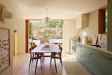 The shared kitchen and dining space opens to a courtyard. The couple wanted to capitalize on L.A.'s sunny weather.