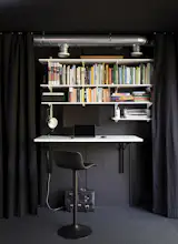 A small workspace can also be curtained-off for other activities.