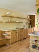 Wang and the owners were meticulous about the cabinetry. They hand-selected each piece of the oak veneer to line up perfectly across each front.