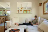 The half-wall was kept between the kitchen and dining space for budgetary reasons, but it also provides some privacy when needed.